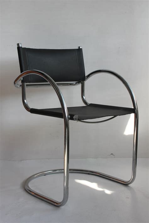 Set Of Four Tubular Steel And Leather Dining Chairs By Matteo Grassi Bauhaus For Sale At 1stdibs