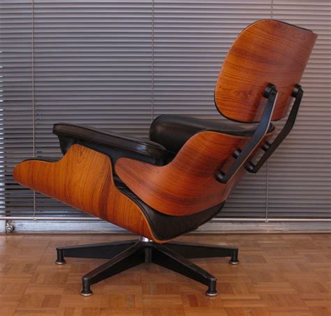 Vintage Black Leather And Rosewood Eames Lounge Chair For Herman Miller