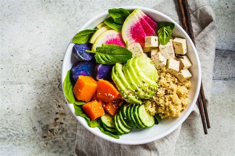 Premium Photo Quinoa Salad With Tofu Avocado And Vegetables In White