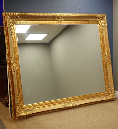 Large Rectangular Bevelled Edge Wall Mirror In Ornate Swept Gilt Frame