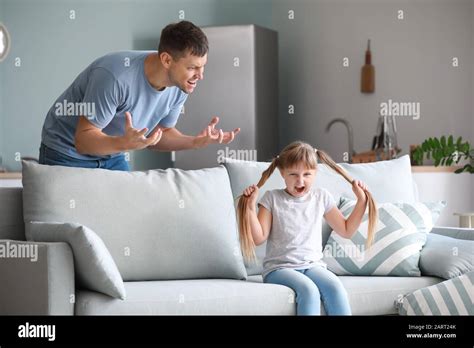 Angry Father Scolding His Daughter At Home Stock Photo Alamy