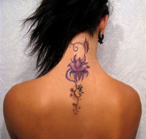 Attractive Lotus Flower Tattoo On Girl Back Neck