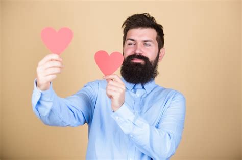 Premium Photo Man Bearded Hipster With Heart Celebrate Valentines Day Guy With Beard And