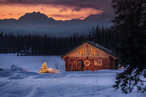 Log Cabin With Christmas Tree Photograph By Jeff Schultz