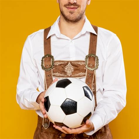 Front View Of Man Holding A Ball Photo Free Download