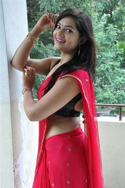 Actress Ashwini Hot Stills In Red Saree New Movie Posters