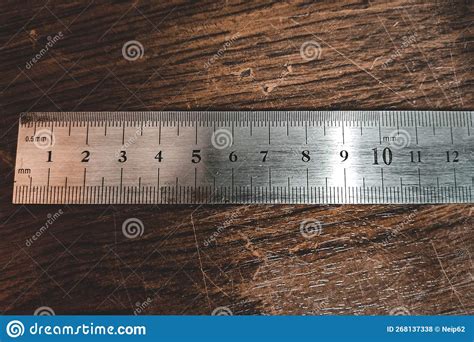 Metal Ruler On Wooden Table Close Up Workbench With Steel Ruler Stock