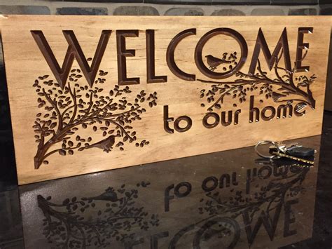 Nature Inspired Welcome Sign with Birds and Branches 