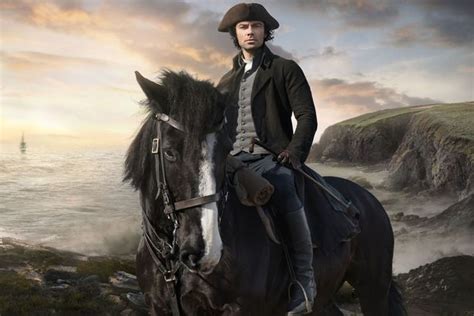 poldark star aidan turner says he is having to fight to keep his clothes on as bosses desperate