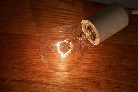 Light Bulb On A Table Stock Image Image Of Dark Circuit 172824485