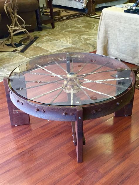 How to style your coffee table so much more than a surface for mugs and tv remotes, a coffee table offers all sorts of potential to brighten up your lounge. Wagon wheel coffee table Metal wagon wheel, black walnut ...
