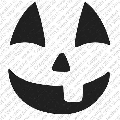 A Black And White Image Of A Pumpkin Face