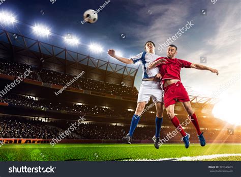 Soccer Players Action On Sunset Stadium Stock Photo 301346669