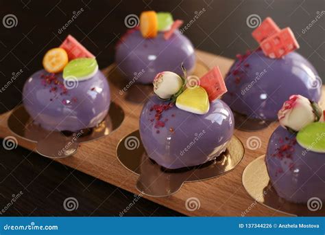 Homemade Bright Mousse Cakes Hearts With Purple Mirror Icing Stock