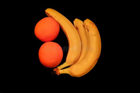 Banana And Orange With A Condom Safe Sex Concept Phallus And Vagina