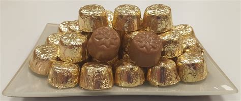 Find the perfect gold wrapped candy stock photos and editorial news pictures from getty images. 16 oz. Gold Foil Wrapped Milk Chocolate Domes