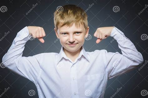 Sport Handsome Boy Strong Serious Kid Showing His Hand Biceps Muscles