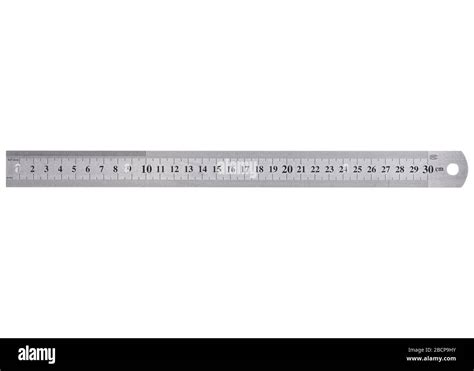 A Metal Ruler With A Scale Of Up To 30 Centimeters Is Isolated On A