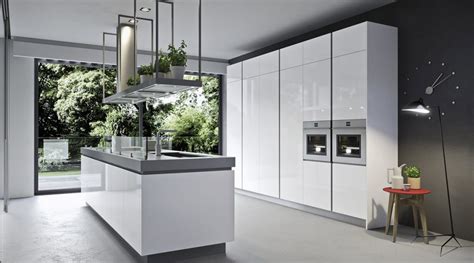 It looks much better than laminated or membrane finish. Zina Acrylic Handleless High Gloss Kitchens | Kitchens London