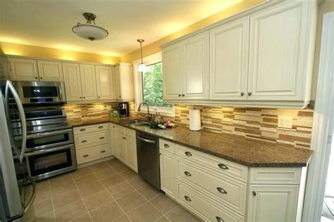 Between the time we selected our appliances while appliance finish trends come and go, appliances faced to match cabinet doors will have as. Image result for kitchen with black appliances and cream ...