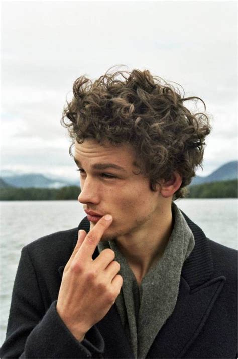 The wavy haircut features top with medium length hair that is swept to one side to give a cool appearance. MEN: How Do I Choose A Hairstyle That's Right For Me?