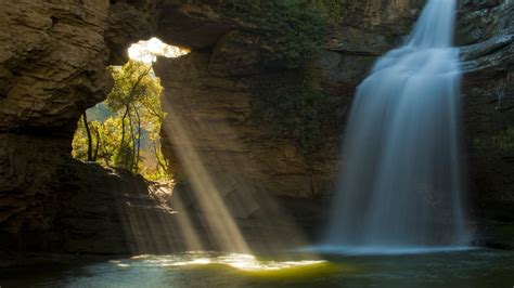 Rays Of The Sun And The Water Fall Into The Cave Wallpapers And Images
