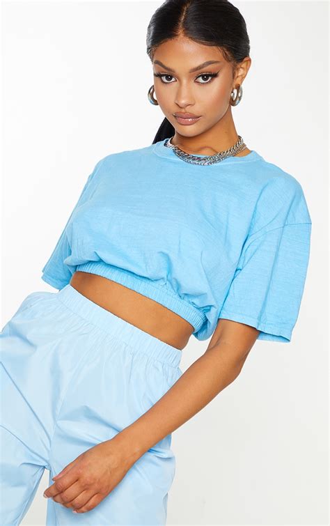 Blue Washed Cropped T Shirt Tops Prettylittlething Usa