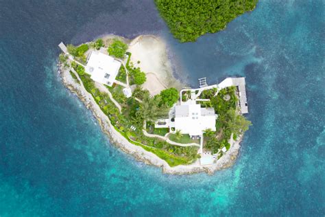Middle Cay Luxurious Private Island Off The Coast Of Harbour Island Blue Sky Luxury Travels