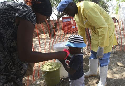 raw sewage in streets cholera is zimbabwe s latest crisis