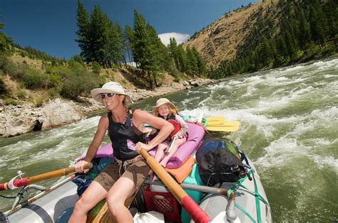 A Mother And Daughter Rowing A Raft Photograph By Kennan Harvey Fine