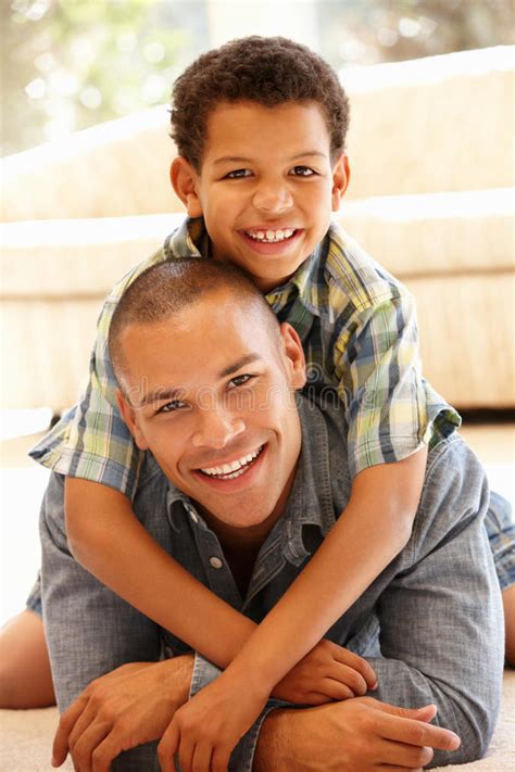 Father And Son At Home Stock Image Image Of Together 55893021