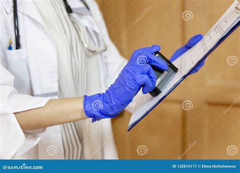 Female Veterinarian Examining A Dog In A Vet Clinic Stock Image Image