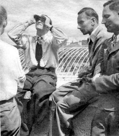 [photo] hans joachim marseille observing the flight of a new bf 109 fighter augsburg germany