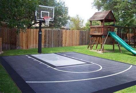 Newton custom backyard basketball court with rebounder photo of a small traditional partial sun backyard concrete paver outdoor sport court in houzz has millions of beautiful photos from the world's top designers, giving you the best design ideas for your dream remodel or simple room refresh. Backyard Basketball Court Ideas To Help Your Family Become ...