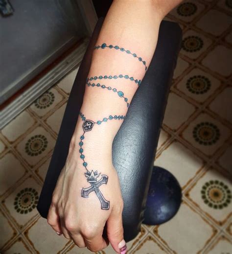 Rosary tattoos, rosary tattoos on arm, rosary tattoos on hand, rosary bead tattoos, rosary tattoos on wrist, rosary tattoos on finger, rosary tattoos with roses, rosary tattoos on forearm, rosary tattoos on ankle, rosary tattoos on foot, rosary tattoos designs. Rafa-Tattoo #rosarybeadtattoo Rafa-Tattoo | Rosary tattoo ...
