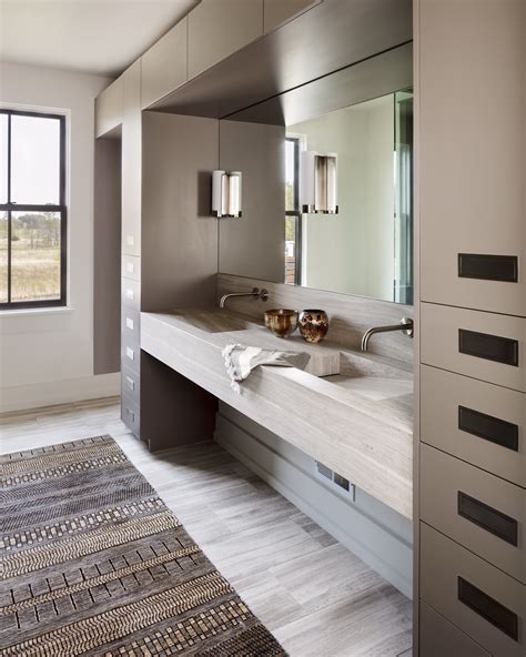 A Modern Neutral Bathroom With Custom Cabinetry Using Natural Organic