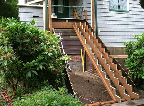 Step down on the interior, and up to two steps down to the landing on the exterior (regardless of which way the door swings, it can only swing over one step). New Exterior Front Entry Stairs | Seattle Historic Home ...