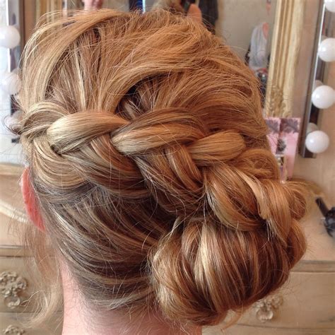 wedding hairstyle for bride or bridesmaid side bun chignon with plait braid plaits