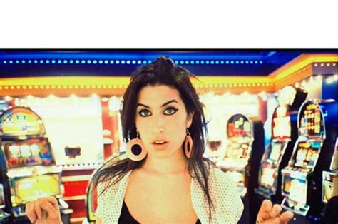 Amy Winehouse Laid Bare In Stunning Photos Released For The Tragic