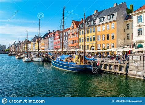 View Of Nyhavn Pier With Color Buildings Ships Yachts And Other Boats