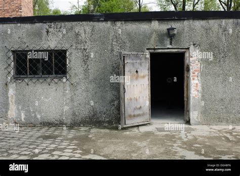 Door To Gas Chamber In Concentration And Extermination Camp Auschwitz