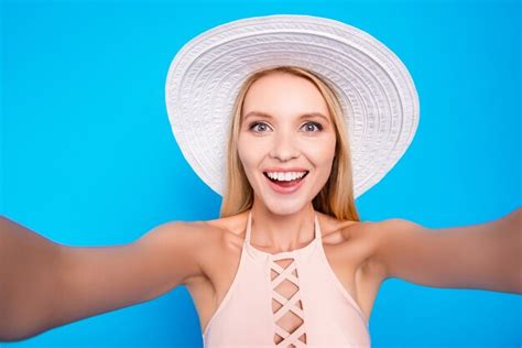 Premium Photo Beautiful Woman Taking Selfie In A Bikini With Hat