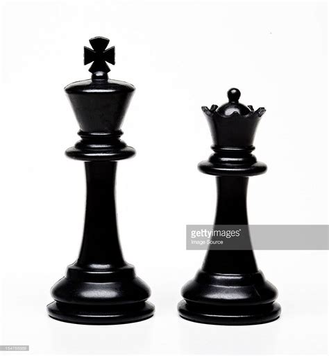 Chess is a game for two players, one with the white pieces and one with the black pieces. https://media.gettyimages.com/photos/chess-king-and-queen ...