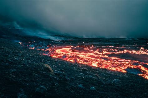 Premium Photo Atmospheric View Of Flowing Lava At Volcano Eruption