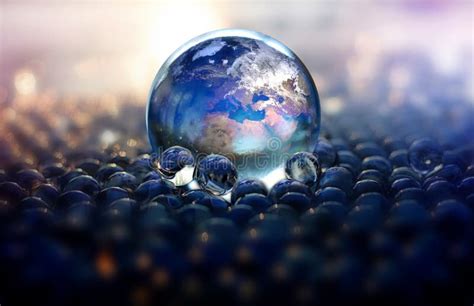 Glass Ball Planet Earth Surrounded By A Vast Number Of Glass Orbs Stock