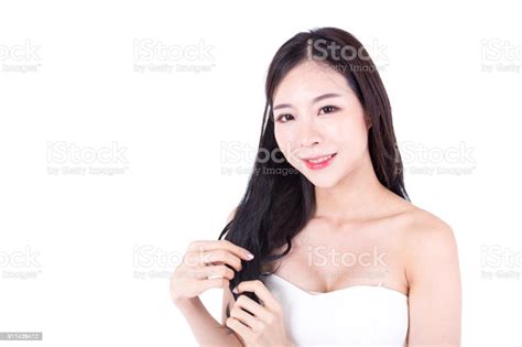 Closeup Beautiful Korea Woman Posing On White Background Korean Woman Holding Her Hair Isolated