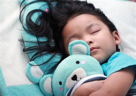 Premium Photo Cute Little Asian Girl Sleep And Hug Teddy Bear