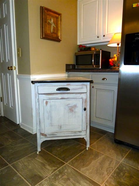 You have your dream cabin on the lake or in the woods, but it does not have kitchen cabinets. a few good pieces...: vintage enamel-topped cabinet