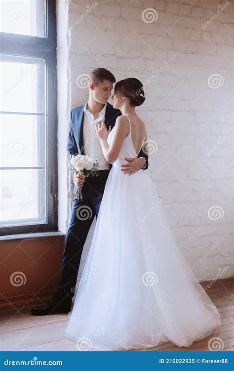 Portrait Of Beautiful Young Couple On Their Wedding Day Stock Image