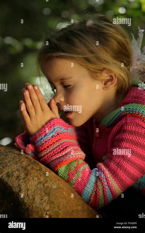 Little Girl Praying Hi Res Stock Photography And Images Alamy
